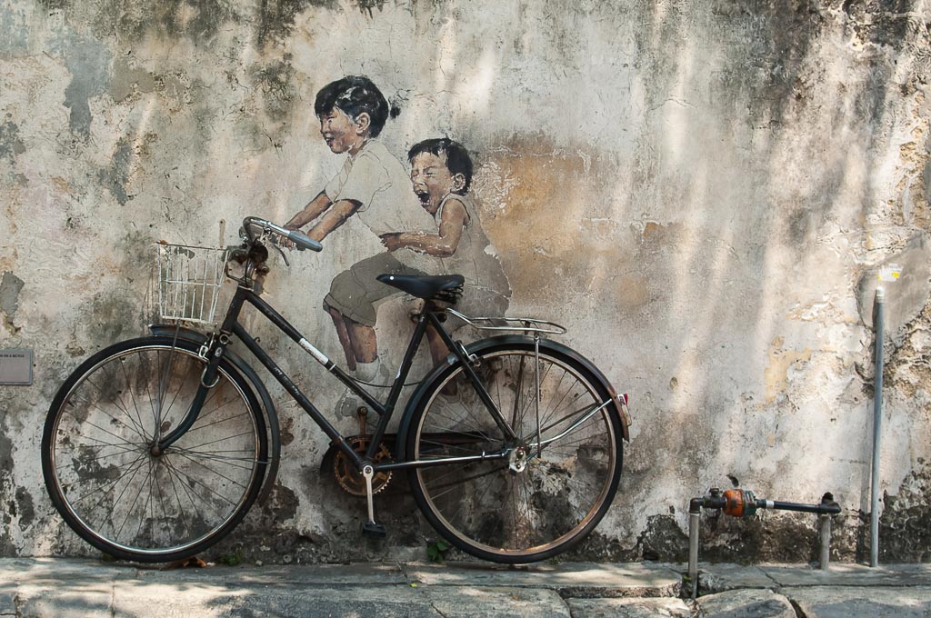 Photo Of The Week – Penang Street Art Kids on Bicycle in Georgetown Penang